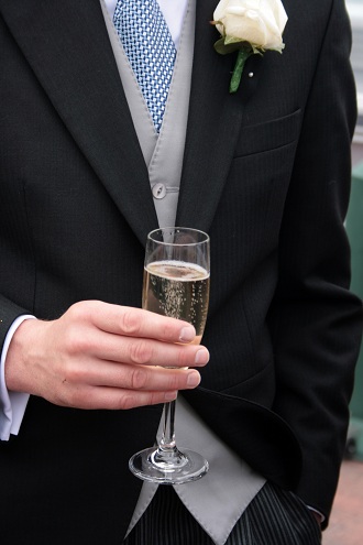 groom with champagne