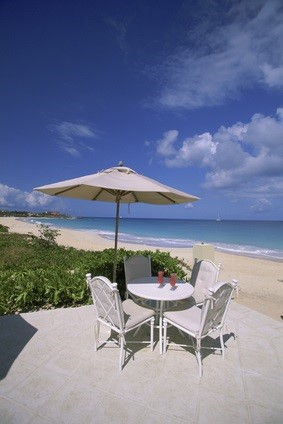 beach table and chairs with umbrella