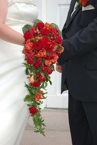 bride with flowers and groom