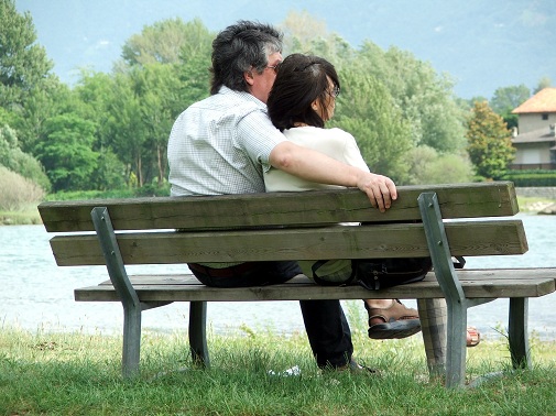 couple sitting on bench