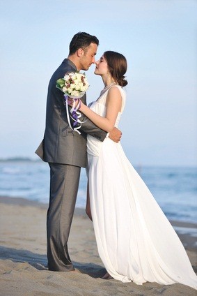newlyweds by the ocean