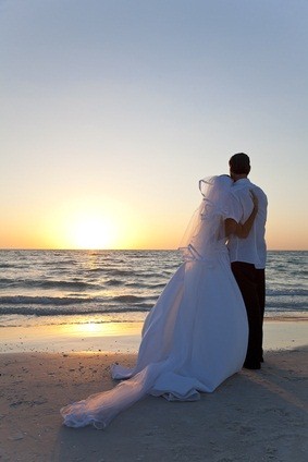 newlyweds watching sunset