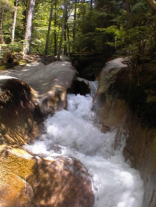 waterfall between rocks