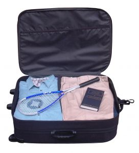 vacation planning tips suitcase packing