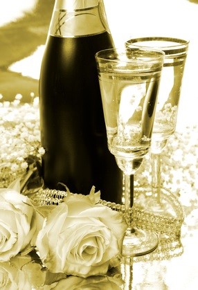 champagne glasses, bottle and rose