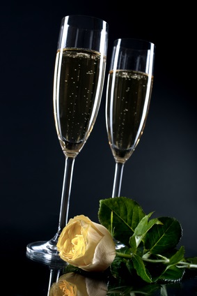 champagne glasses and rose
